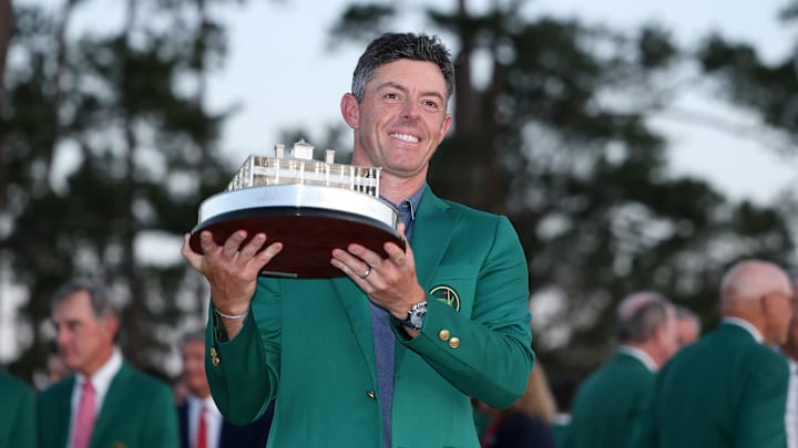 Rory McIlroy holds the winner's trophy after his victory at the 2025 Masters at Augusta National Golf Club