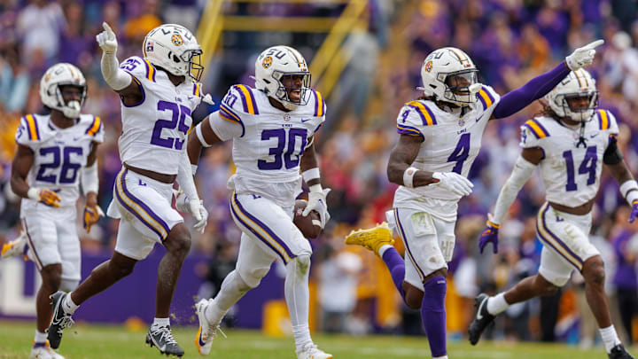 Nov 25, 2023; Baton Rouge, Louisiana, USA;  LSU Tigers linebacker Greg Penn III (30) reacts to