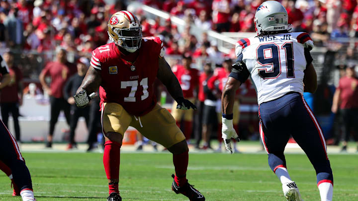 Sep 29, 2024; Santa Clara, California, USA; San Francisco 49ers offensive tackle Trent Williams (71) blocks against New England Patriots defensive end Deatrich Wise Jr. (91) during the second quarter at Levi's Stadium. Mandatory Credit: Sergio Estrada-Imagn Images Sep 29, 2024; Santa Clara, California, USA; San Francisco 49ers offensive tackle Trent Williams (71) blocks against New England Patriots defensive end Deatrich Wise Jr. (91) during the second quarter at Levi's Stadium. Mandatory Credit: Sergio Estrada-Imagn Images