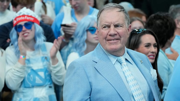 Mar 8, 2025; Chapel Hill, North Carolina, USA; North Carolina Tar Heels football coach Bill Belichick before the game at Dean E. Smith Center. Mandatory Credit: Bob Donnan-Imagn Images Mar 8, 2025; Chapel Hill, North Carolina, USA; North Carolina Tar Heels football coach Bill Belichick before the game at Dean E. Smith Center. Mandatory Credit: Bob Donnan-Imagn Images