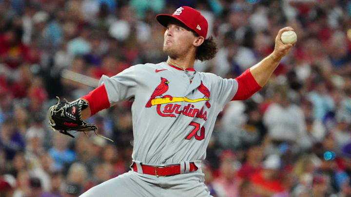 Aug 9, 2022; Denver, Colorado, USA; St. Louis Cardinals relief pitcher Packy Naughton (70) delivers a pitch in the fourth inning against the Colorado Rockies at Coors Field. Mandatory Credit: Ron Chenoy-Imagn Images