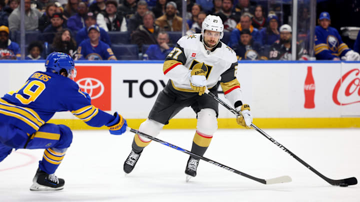 Mar 3, 2026; Buffalo, New York, USA; Vegas Golden Knights defenseman Shea Theodore (27) looks to make a pass as Buffalo Sabres center Peyton Krebs (19) defends during the third period at KeyBank Center. Mandatory Credit: Timothy T. Ludwig-Imagn Images Mar 3, 2026; Buffalo, New York, USA; Vegas Golden Knights defenseman Shea Theodore (27) looks to make a pass as Buffalo Sabres center Peyton Krebs (19) defends during the third period at KeyBank Center. Mandatory Credit: Timothy T. Ludwig-Imagn Images