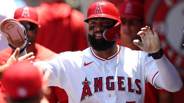 Jun 14, 2026; Anaheim, California, USA; Los Angeles Angels right fielder Jo Adell (7) is greeted in the dugout after scoring a run during the second inning against the Tampa Bay Rays at Angel Stadium. Mandatory Credit: Kiyoshi Mio-Imagn Images Jun 14, 2026; Anaheim, California, USA; Los Angeles Angels right fielder Jo Adell (7) is greeted in the dugout after scoring a run during the second inning against the Tampa Bay Rays at Angel Stadium. Mandatory Credit: Kiyoshi Mio-Imagn Images