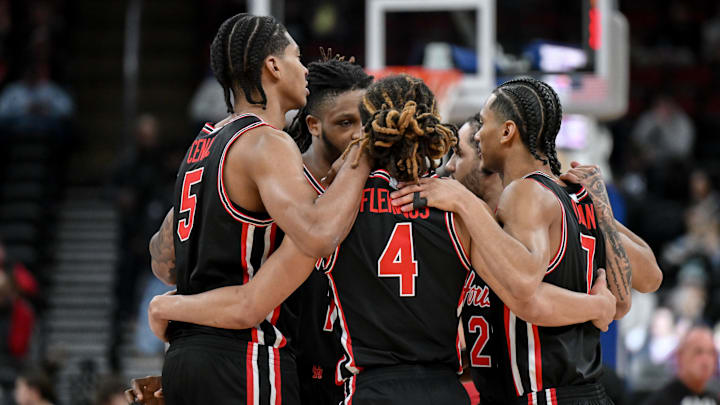 Dec 20, 2025; Newark, New Jersey, USA; Houston Cougars huddle before the start of the game against the Arkansas Razorbacks at Prudential Center. 
