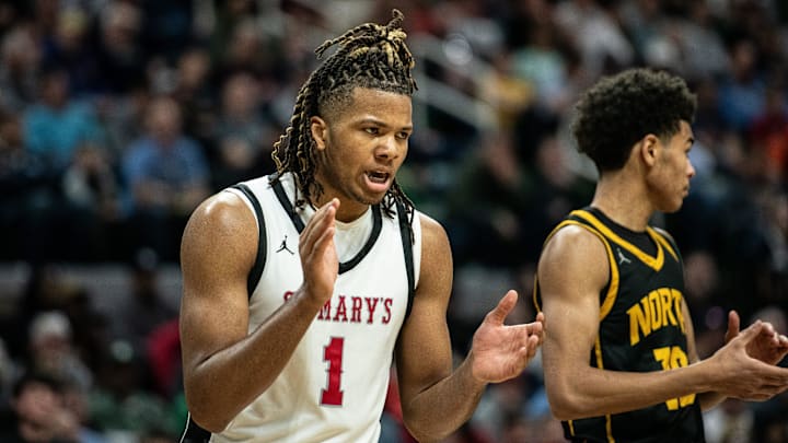 Orchard Lake St. Mary's Trey McKenney celebrates a big play during the Division 1 boys basketball state championship on Saturday, March 16, 2024, at Michigan State University's Breslin Center.