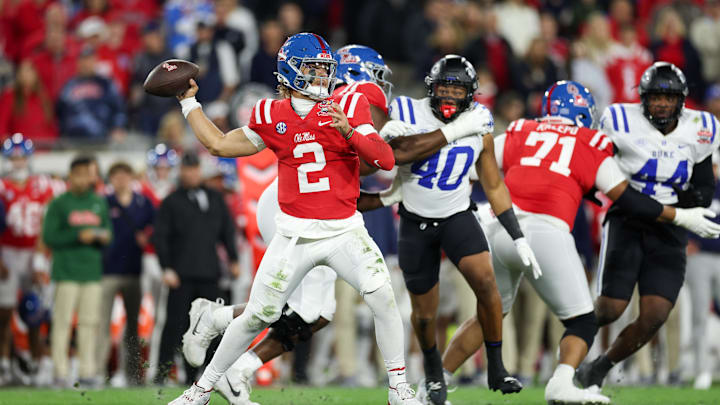 Jan 2, 2025; Jacksonville, FL, USA; Mississippi Rebels quarterback Jaxson Dart (2) drops back to pass against the Duke Blue Devils in the first quarter during the Gator Bowl at EverBank Stadium. Mandatory Credit: Nathan Ray Seebeck-Imagn Images Jan 2, 2025; Jacksonville, FL, USA; Mississippi Rebels quarterback Jaxson Dart (2) drops back to pass against the Duke Blue Devils in the first quarter during the Gator Bowl at EverBank Stadium. Mandatory Credit: Nathan Ray Seebeck-Imagn Images