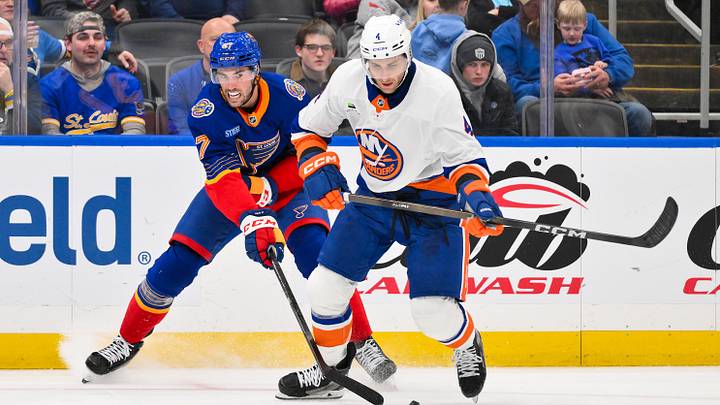 Mar 10, 2026; St. Louis, Missouri, USA; St. Louis Blues center Jack Finley (37) and New York Islanders defenseman Carson Soucy (4) battle for the puck during the second period at Enterprise Center. Mandatory Credit: Jeff Curry-Imagn Images Mar 10, 2026; St. Louis, Missouri, USA; St. Louis Blues center Jack Finley (37) and New York Islanders defenseman Carson Soucy (4) battle for the puck during the second period at Enterprise Center. Mandatory Credit: Jeff Curry-Imagn Images