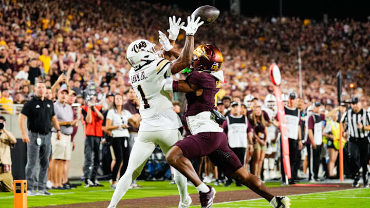 Sep 13, 2025; Tempe, Arizona, USA; Arizona State Sun Devils defensive back Keith Abney II (1) breaks up a pass intended for Texas State Bobcats wide receiver Chris Dawn Jr. (1) in the second quarter of the game between Arizona State Sun Devils and Texas State Bobcats. Mandatory Credit: Arianna Grainey-Imagn Images