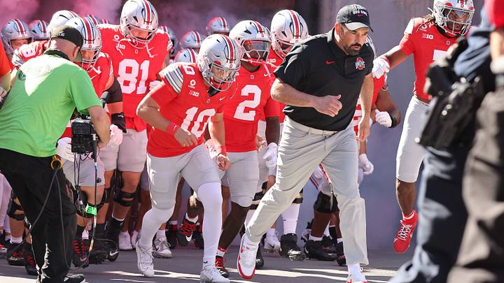 Sep 26, 2026; Columbus, Ohio, USA; Ohio State Buckeyes head coach Ryan Day and quarterback Julian Sayin (10) enter the field with teammates before the game against the Illinois Fighting Illini at Ohio Stadium. Mandatory Credit: Joseph Maiorana-Imagn Images Sep 26, 2026; Columbus, Ohio, USA; Ohio State Buckeyes head coach Ryan Day and quarterback Julian Sayin (10) enter the field with teammates before the game against the Illinois Fighting Illini at Ohio Stadium. Mandatory Credit: Joseph Maiorana-Imagn Images