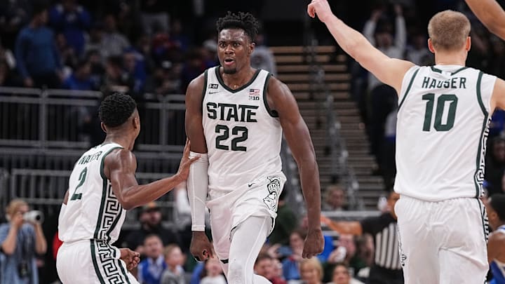 Michigan State Spartans center Mady Sissoko (22) rushes up the court in excitement after dunking the ball Tuesday, Nov 15, 2022 at Gainbridge Fieldhouse in Indianapolis. The Michigan State  Spartans defeated the Kentucky Wildcats in double overtime, 86-77.

Ncaa Basketball Uk Vs Michigan State Hoops Michigan State Spartans At University Of Kentucky Wildcats