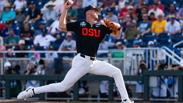 Jun 13, 2025; Omaha, Neb, USA; Oregon State Beavers starting pitcher Dax Whitney (30) pitches against the Louisville Cardinals during the first inning at Charles Schwab Field. Mandatory Credit: Dylan Widger-Imagn Images