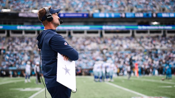 Dallas Cowboys head coach Brian Schottenheimer looks on from the sideline during the first quarter against the Carolina Panthers 