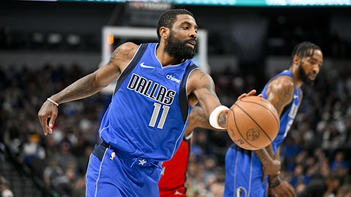 Jan 13, 2024; Dallas, Texas, USA; Dallas Mavericks guard Kyrie Irving (11) drives to the basket