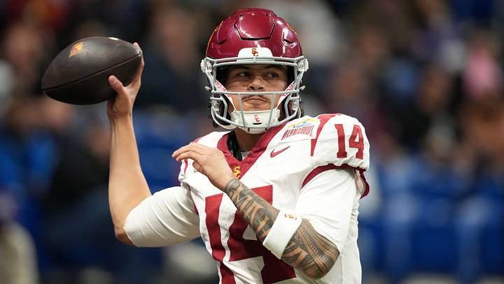Dec 30, 2025; San Antonio, TX, USA; Southern California Trojans quarterback Jayden Maiava (14) throws the ball against the TCU Horned Frogs in the first half during the Alamo Bowl at Alamodome. Mandatory Credit: Kirby Lee-Imagn Images Dec 30, 2025; San Antonio, TX, USA; Southern California Trojans quarterback Jayden Maiava (14) throws the ball against the TCU Horned Frogs in the first half during the Alamo Bowl at Alamodome. Mandatory Credit: Kirby Lee-Imagn Images