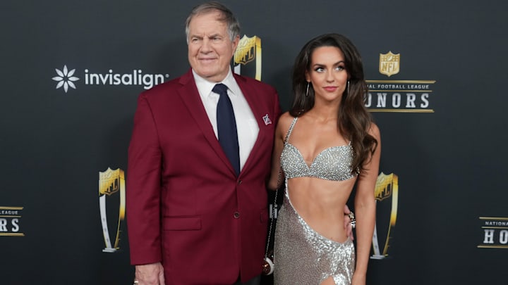Bill Belichick and Jordon Hudson on the red carpet before Super Bowl LIX NFL Honors at Saenger Theatre.