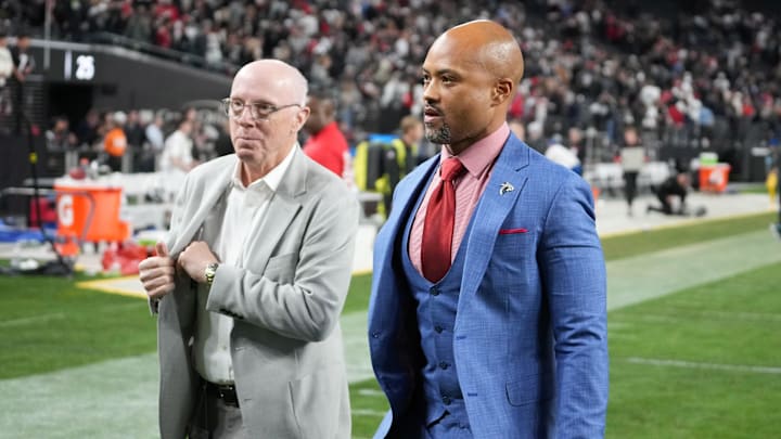 Dec 16, 2024; Paradise, Nevada, USA; Atlantic Falcons chief executive officer Rich McKay (left) and general manager Terry Fontenot leave the field after the game against the Las Vegas Raiders at Allegiant Stadium. Mandatory Credit: Kirby Lee-Imagn Images
