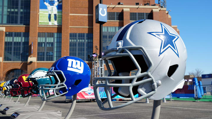 Feb 28, 2024; Indianapolis, IN, USA; A general view of large Dallas Cowboys and New York Giants helmets at the NFL Scouting Combine Experience at Lucas Oil Stadium. Mandatory Credit: Kirby Lee-Imagn Images