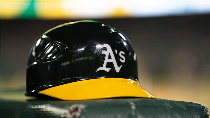 Jul 23, 2024; Oakland, California, USA; General view of an Oakland Athletics helmet after defeating the Houston Astros at Oakland-Alameda County Coliseum. Mandatory Credit: Stan Szeto-Imagn Images Jul 23, 2024; Oakland, California, USA; General view of an Oakland Athletics helmet after defeating the Houston Astros at Oakland-Alameda County Coliseum. Mandatory Credit: Stan Szeto-Imagn Images