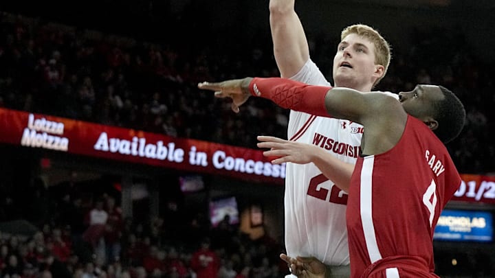 Wisconsin forward Steven Crowl (22) scores on Nebraska forward Juwan Gary (4) during the second half