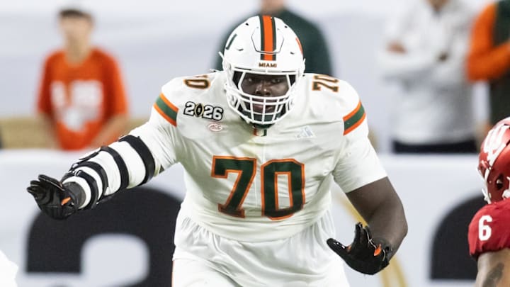 Jan 19, 2026; Miami Gardens, FL, USA; Miami Hurricanes offensive lineman Markel Bell (70) against the Indiana Hoosiers during the College Football Playoff National Championship game at Hard Rock Stadium. Mandatory Credit: Mark J. Rebilas-Imagn Images