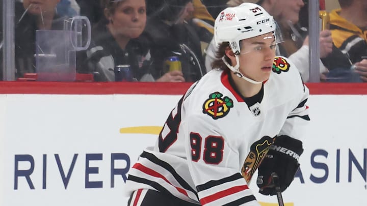 Apr 8, 2025; Pittsburgh, Pennsylvania, USA;  Chicago Blackhawks center Connor Bedard (98) skates with the puck against the Pittsburgh Penguins during the first period at PPG Paints Arena. Mandatory Credit: Charles LeClaire-Imagn Images