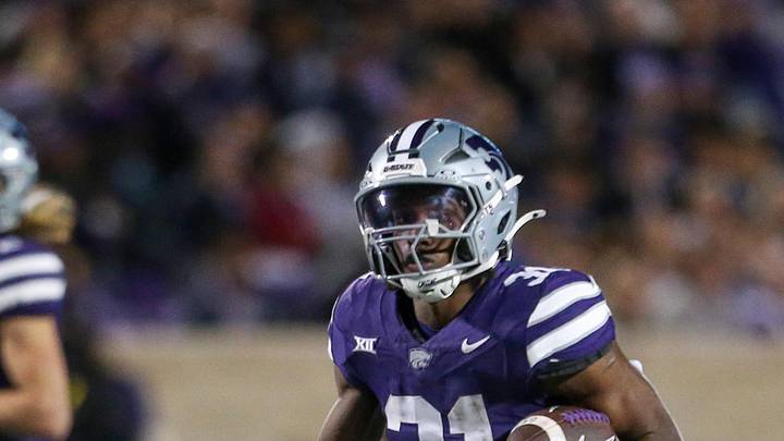 Nov 16, 2024; Manhattan, Kansas, USA; Kansas State Wildcats running back DJ Giddens (31) runs the ball against the Arizona State Sun Devils during the third quarter at Bill Snyder Family Football Stadium. Mandatory Credit: Scott Sewell-Imagn Images Nov 16, 2024; Manhattan, Kansas, USA; Kansas State Wildcats running back DJ Giddens (31) runs the ball against the Arizona State Sun Devils during the third quarter at Bill Snyder Family Football Stadium. Mandatory Credit: Scott Sewell-Imagn Images