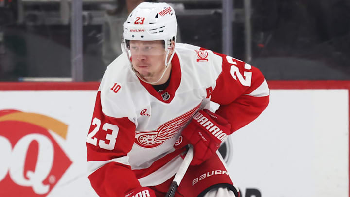 Jan 1, 2026; Pittsburgh, Pennsylvania, USA;  Detroit Red Wings left wing Lucas Raymond (23) skates with the puck against the Pittsburgh Penguins during the third period at PPG Paints Arena. Mandatory Credit: Charles LeClaire-Imagn Images
