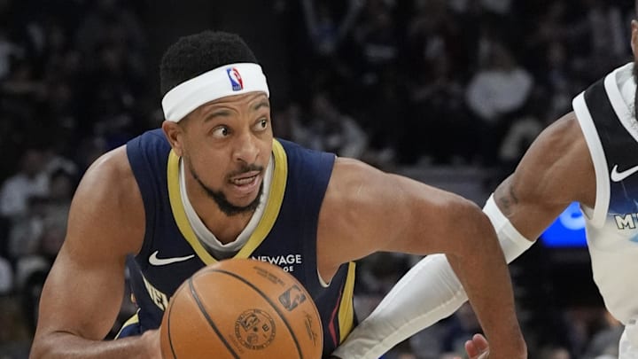Mar 21, 2025; Minneapolis, Minnesota, USA; New Orleans Pelicans guard CJ McCollum (3) works around Minnesota Timberwolves guard Mike Conley (10) in the third quarter at Target Center. Mandatory Credit: Bruce Kluckhohn-Imagn Images