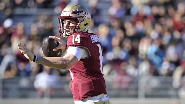 Nov 23, 2024; Tallahassee, Florida, USA; Florida State Seminoles quarterback Luke Kromenhoek (14) looks to throw during the second half of the game against the Charleston Southern Buccaneers at Doak S. Campbell Stadium. Mandatory Credit: Melina Myers-Imagn Images
