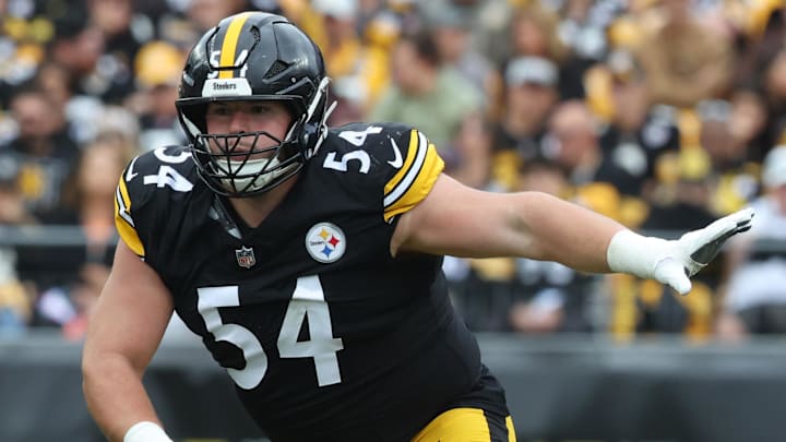 Oct 12, 2025; Pittsburgh, Pennsylvania, USA;  Pittsburgh Steelers center Zach Frazier (54) blocks at the line of scrimmage against the Cleveland Browns during the second quarter at Acrisure Stadium. Mandatory Credit: Charles LeClaire-Imagn Images