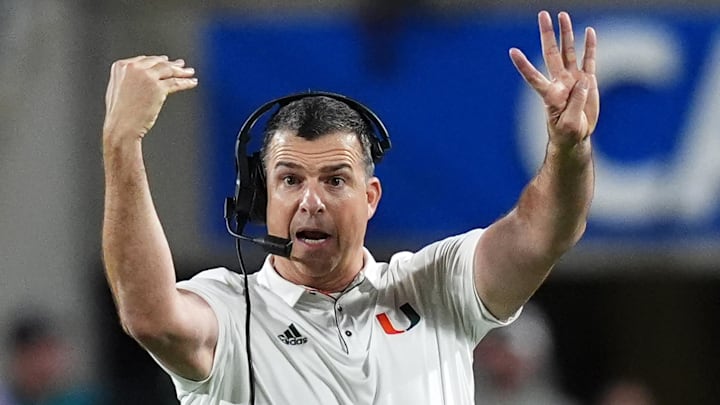 Dec 28, 2024; Orlando, FL, USA; Miami Hurricanes head coach Mario Cristobal reacts during the second half against the Iowa State Cyclones at Camping World Stadium. Mandatory Credit: Jasen Vinlove-Imagn Images