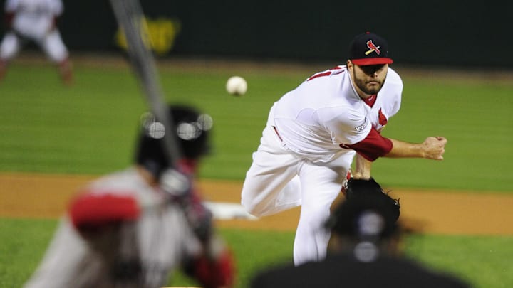 Oct 27, 2013; St. Louis, MO, USA; St. Louis Cardinals starting pitcher Lance Lynn (31) throws against Boston Red Sox second baseman Dustin Pedroia (15) during the first inning of game four of the MLB baseball World Series at Busch Stadium. Mandatory Credit: Jeff Curry-Imagn Images Oct 27, 2013; St. Louis, MO, USA; St. Louis Cardinals starting pitcher Lance Lynn (31) throws against Boston Red Sox second baseman Dustin Pedroia (15) during the first inning of game four of the MLB baseball World Series at Busch Stadium. Mandatory Credit: Jeff Curry-Imagn Images