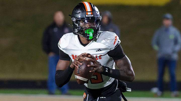 Belleville's Bryce Underwood rolls out to pass during a loss to Howell Friday, Oct. 25, 2024. Belleville's Bryce Underwood rolls out to pass during a loss to Howell Friday, Oct. 25, 2024.