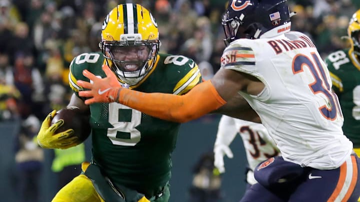 Green Bay Packers running back Josh Jacobs (8) against the Chicago Bears safety Kevin Byard III (31) on Sunday, December 7, 2025, at Lambeau Field in Green Bay, Wis. The Packers defeated the Bears 28-21. Green Bay Packers running back Josh Jacobs (8) against the Chicago Bears safety Kevin Byard III (31) on Sunday, December 7, 2025, at Lambeau Field in Green Bay, Wis. The Packers defeated the Bears 28-21.