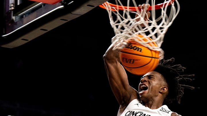 Cincinnati Bearcats guard-forward Rayvon Griffith (3) dunks in the second half of a basketball scrimmage between Cincinnati Bearcats and Ohio State Buckeyes at Fifth Third Arena in Cincinnati on Friday, Oct. 18, 2024. Cincinnati Bearcats guard-forward Rayvon Griffith (3) dunks in the second half of a basketball scrimmage between Cincinnati Bearcats and Ohio State Buckeyes at Fifth Third Arena in Cincinnati on Friday, Oct. 18, 2024.