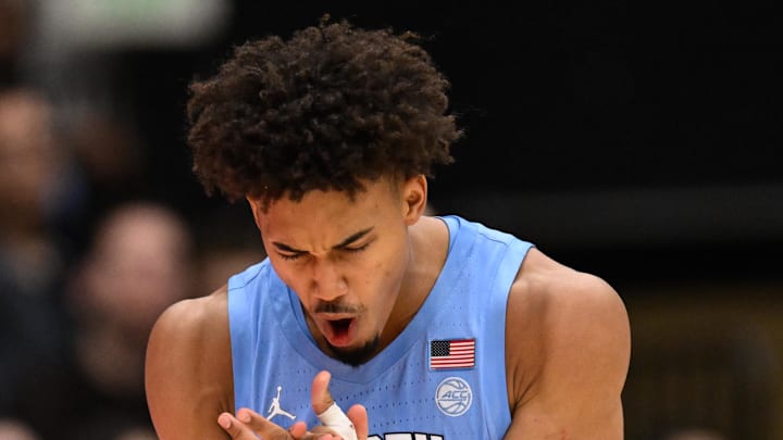 Jan 14, 2026; Stanford, California, USA; North Carolina Tar Heels guard Seth Trimble (7) celebrates against the Stanford Cardinal in the second half at Maples Pavilion. Mandatory Credit: Eakin Howard-Imagn Images