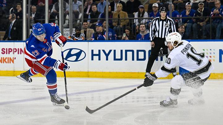 Oct 26, 2026; New York, New York, USA; New York Rangers defenseman Adam Fox (23) attempts a shot defended by Los Angeles Kings left wing Artemi Panarin (10) during the first period at Madison Square Garden. Mandatory Credit: Dennis Schneidler-Imagn Images Oct 26, 2026; New York, New York, USA; New York Rangers defenseman Adam Fox (23) attempts a shot defended by Los Angeles Kings left wing Artemi Panarin (10) during the first period at Madison Square Garden. Mandatory Credit: Dennis Schneidler-Imagn Images