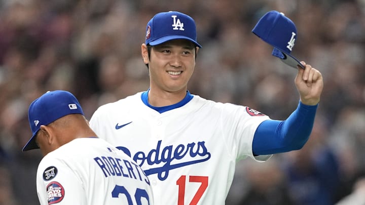 Mar 16, 2025: Los Angeles Dodgers designated hitter Shohei Ohtani gestures before the game against the Hanshin Tigers at the Tokyo Dome.