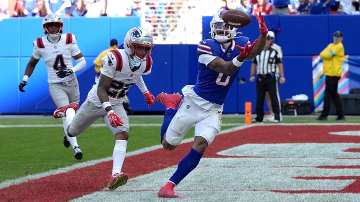 Buffalo Bills wide receiver Keon Coleman (0) makes a catch for a touchdown as New England Patriots cornerback Charles Woods (22) defends during the fourth quarter at New Highmark Stadium. Buffalo Bills wide receiver Keon Coleman (0) makes a catch for a touchdown as New England Patriots cornerback Charles Woods (22) defends during the fourth quarter at New Highmark Stadium.