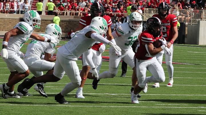 North Texas Mean Green defensive back Ethan Wesloski (left).