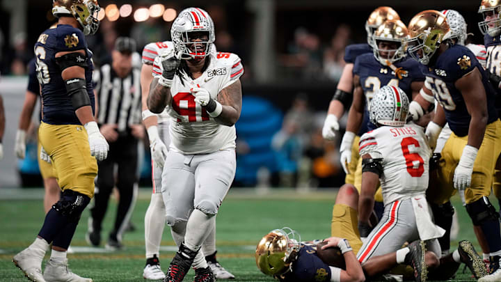 Ohio State Buckeyes defensive tackle Tyleik Williams (91) celebrates a sack against the Notre Dame Fighting Irish in the third quarter during the College Football Playoff championship at Mercedes-Benz Stadium in Atlanta on January 20, 2025. Ohio State Buckeyes defensive tackle Tyleik Williams (91) celebrates a sack against the Notre Dame Fighting Irish in the third quarter during the College Football Playoff championship at Mercedes-Benz Stadium in Atlanta on January 20, 2025.