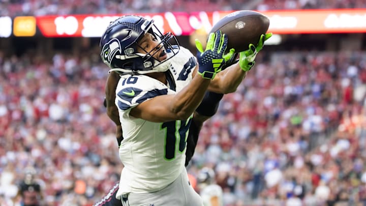 Dec 8, 2024; Glendale, Arizona, USA; Seattle Seahawks wide receiver Tyler Lockett (16) against the Arizona Cardinals at State Farm Stadium.