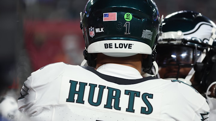 Jan 15, 2024; Tampa, Florida, USA; Philadelphia Eagles quarterback Jalen Hurts (1) wears an MLK sticker on his helmet in observance of Martin Luther King Jr. Day before a 2024 NFC wild card game against the Tampa Bay Buccaneers at Raymond James Stadium. Mandatory Credit: Kim Klement Neitzel-Imagn Images Jan 15, 2024; Tampa, Florida, USA; Philadelphia Eagles quarterback Jalen Hurts (1) wears an MLK sticker on his helmet in observance of Martin Luther King Jr. Day before a 2024 NFC wild card game against the Tampa Bay Buccaneers at Raymond James Stadium. Mandatory Credit: Kim Klement Neitzel-Imagn Images