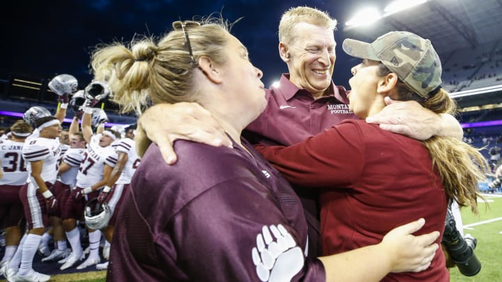 Montana Grizzlies head coach Bobby Hauck celebrates a 13-7 victory over the Huskies at Husky Stadium in 2021. Montana Grizzlies head coach Bobby Hauck celebrates a 13-7 victory over the Huskies at Husky Stadium in 2021.