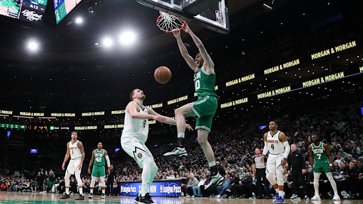Mar 2, 2025; Boston, Massachusetts, USA; Boston Celtics center Luke Kornet (40) dunks the ball during the second half against the Denver Nuggets at TD Garden. Mandatory Credit: Paul Rutherford-Imagn Images Mar 2, 2025; Boston, Massachusetts, USA; Boston Celtics center Luke Kornet (40) dunks the ball during the second half against the Denver Nuggets at TD Garden. Mandatory Credit: Paul Rutherford-Imagn Images