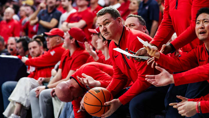 Feb 22, 2025; Tucson, Arizona, USA; Arizona Wildcats head coach Tommy Lloyd looks at the referee after BYU Cougars guard Trey Stewart (1) threw the ball at him by accident during the second half at McKale Center. Mandatory Credit: Aryanna Frank-Imagn Images