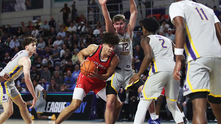Cameron Boozer of the Miami Columbus High School basketball team drives to the basket during the championship game against Montverde at the City of Palms Classic at Suncoast Credit Union Arena in Fort Myers on Monday, Dec. 23, 2024.