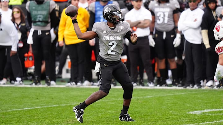 Nov 16, 2024; Boulder, Colorado, USA; Colorado Buffaloes quarterback Shedeur Sanders (2) prepares to pass in the second half against the Utah Utes at Folsom Field. Mandatory Credit: Ron Chenoy-Imagn Images
