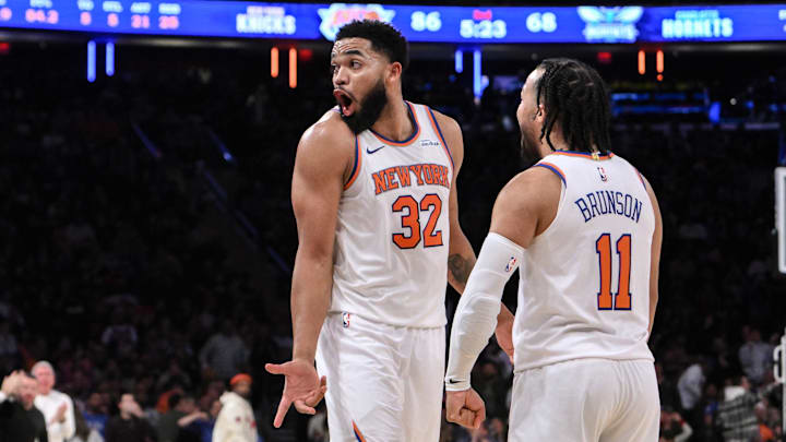 Dec 5, 2024; New York, New York, USA; New York Knicks center Karl-Anthony Towns (32) and New York Knicks guard Jalen Brunson (11) react during the second half against the Charlotte Hornets at Madison Square Garden. Mandatory Credit: John Jones-Imagn Images