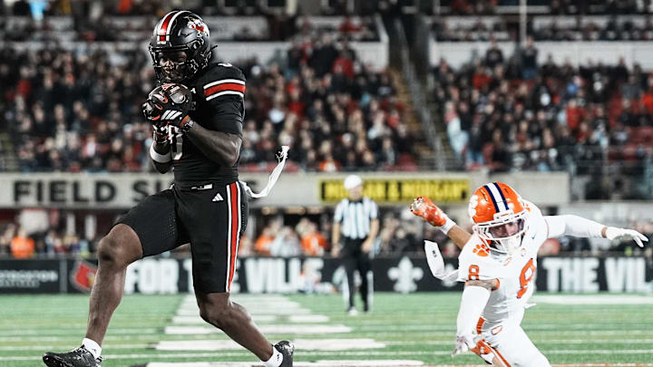 Louisville Cardinals wide receiver Chris Bell (0) got close to the end zone but officials ruled against his touchdown after a replay review as the Cards take on Clemson in the first half at L&N Stadium Friday, Nov. 14, 2025.